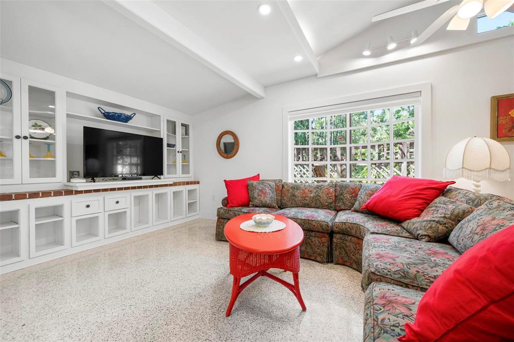 528 45th Street Sarasota, FL 34234 - Photo 13 of 45 a living room with furniture and a flat screen tv