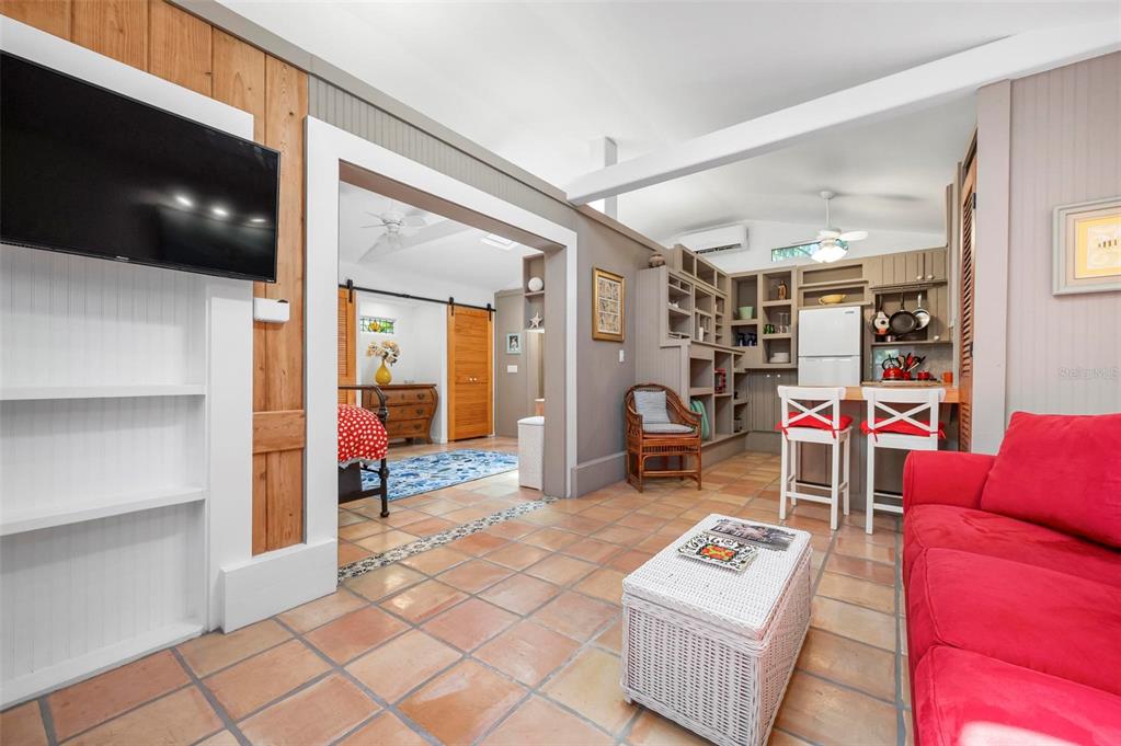 528 45th Street Sarasota, FL 34234 - Photo 29 of 45 a living room with furniture and a flat screen tv