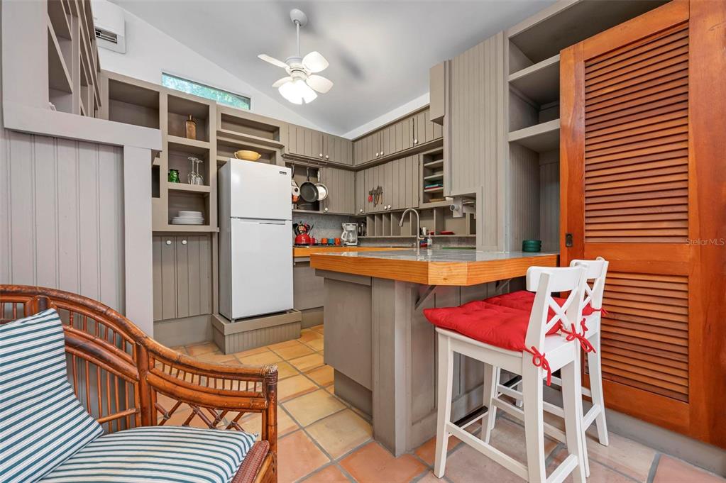 528 45th Street Sarasota, FL 34234 - Photo 31 of 45 a view of a kitchen with a sink and dishwasher