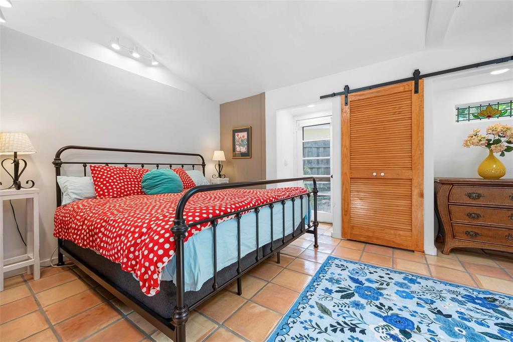 528 45th Street Sarasota, FL 34234 - Photo 35 of 45 a bedroom with a bed and a window