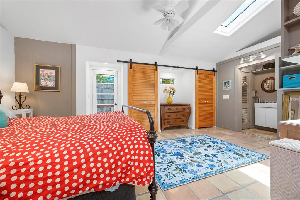 528 45th Street Sarasota, FL 34234 - Photo 36 of 45 a bedroom with a bed and a dresser