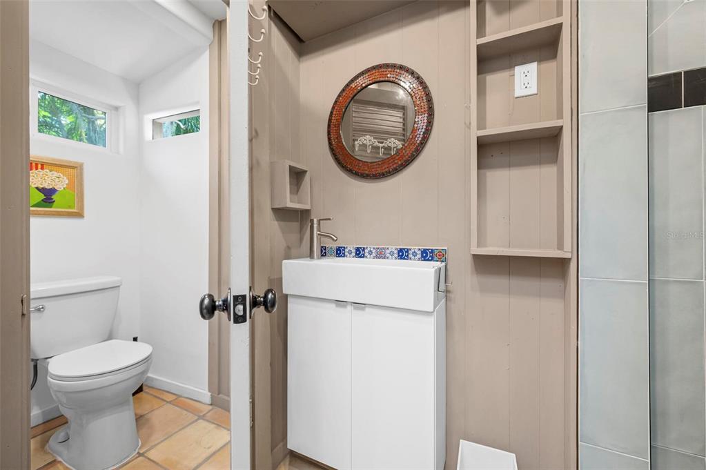 528 45th Street Sarasota, FL 34234 - Photo 41 of 45 a bathroom with a toilet and a vanity