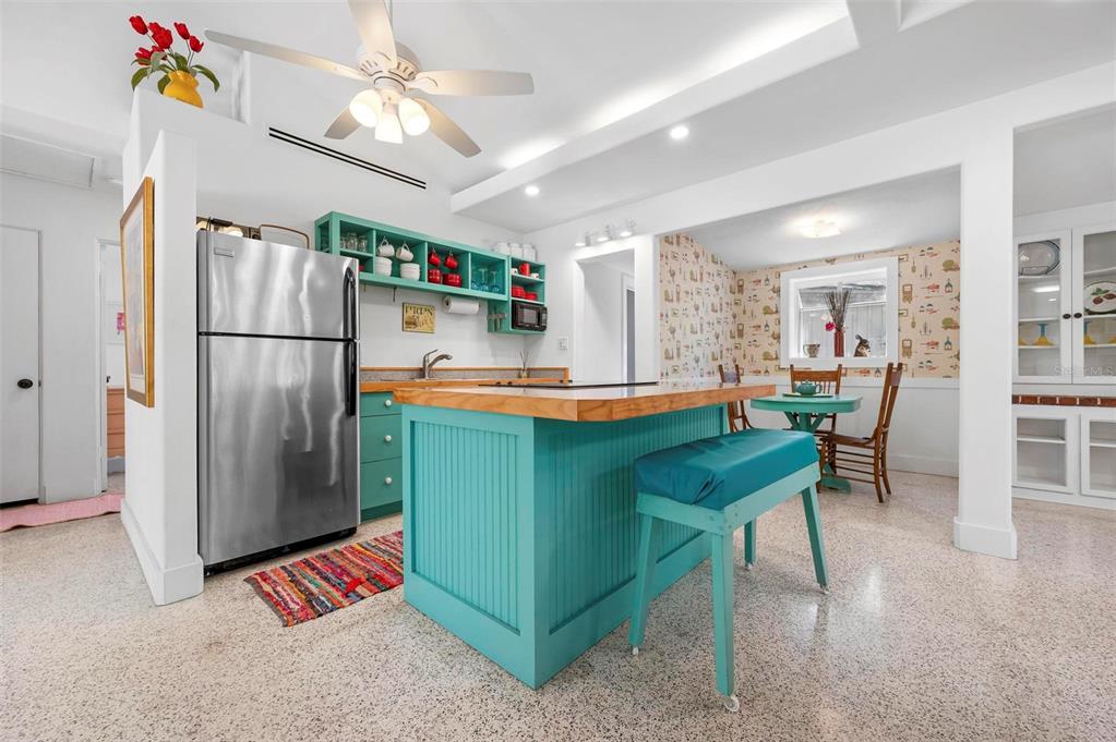 528 45th Street Sarasota, FL 34234 - Photo 9 of 45 a kitchen with stainless steel appliances granite countertop a refrigerator and a sink