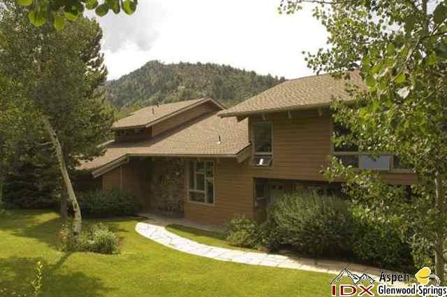 205 Glen Eagle Drive Aspen, CO 81611 - Photo 7 of 8 a front view of a house with a yard
