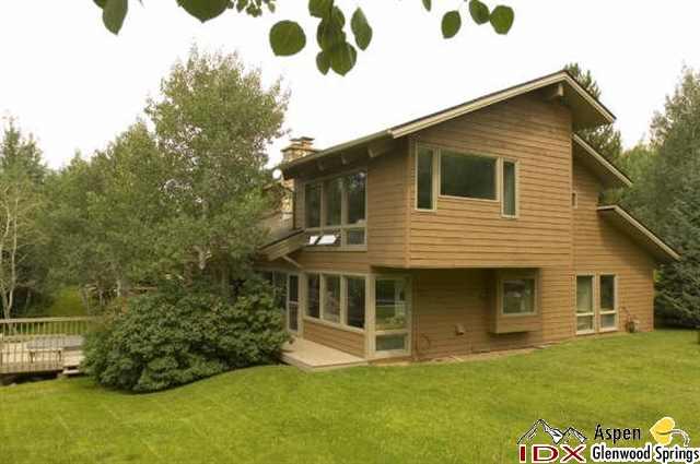 205 Glen Eagle Drive Aspen, CO 81611 - Photo 8 of 8 a view of a house with a yard