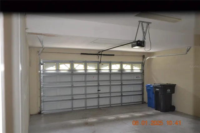 a kitchen with a sink and a yard