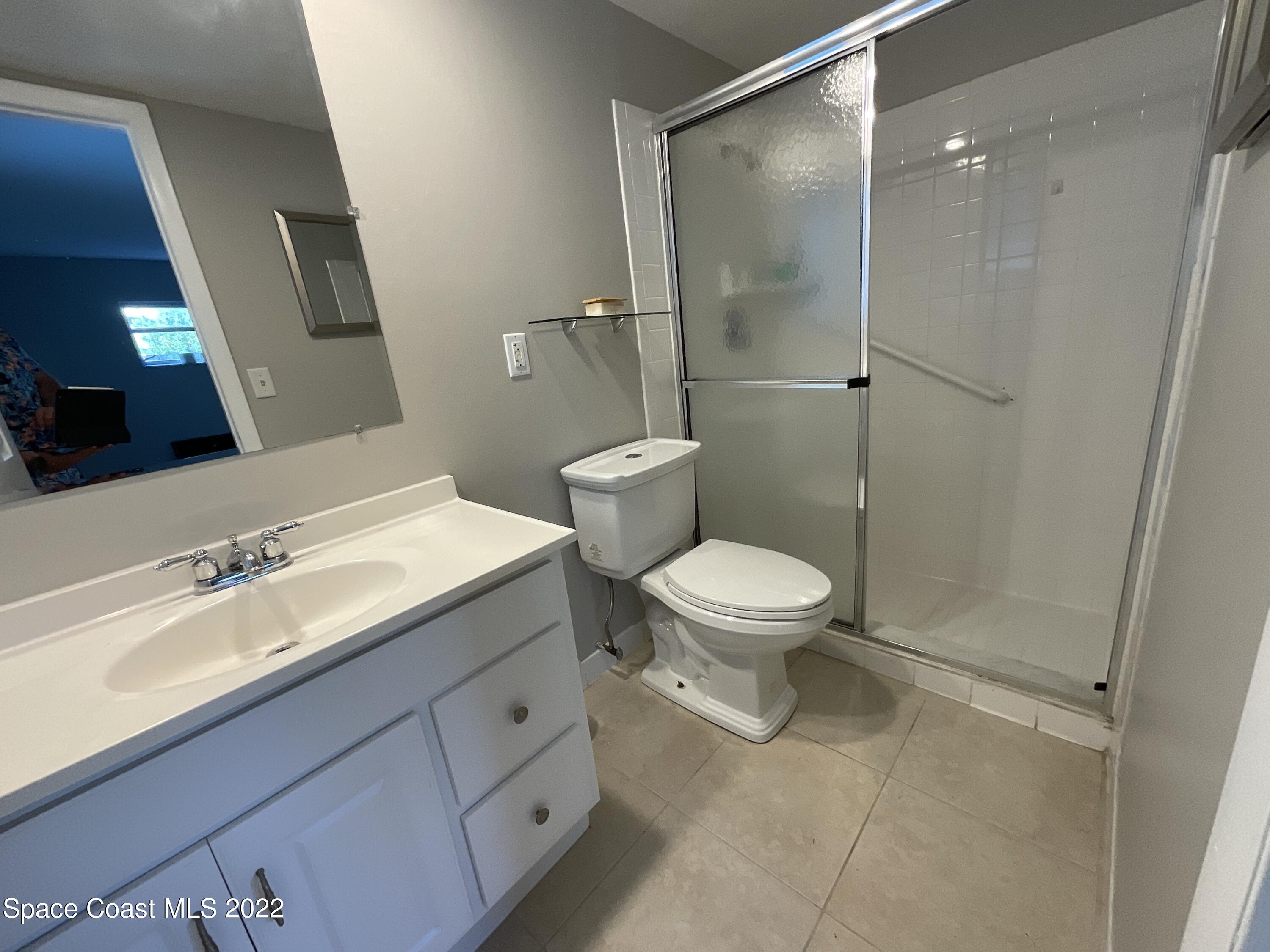 941 Kings Post Road Rockledge, FL 32955 - Photo 12 of 13 9BD3D65D-FAC4-495B-A740-A4F73F091ED7