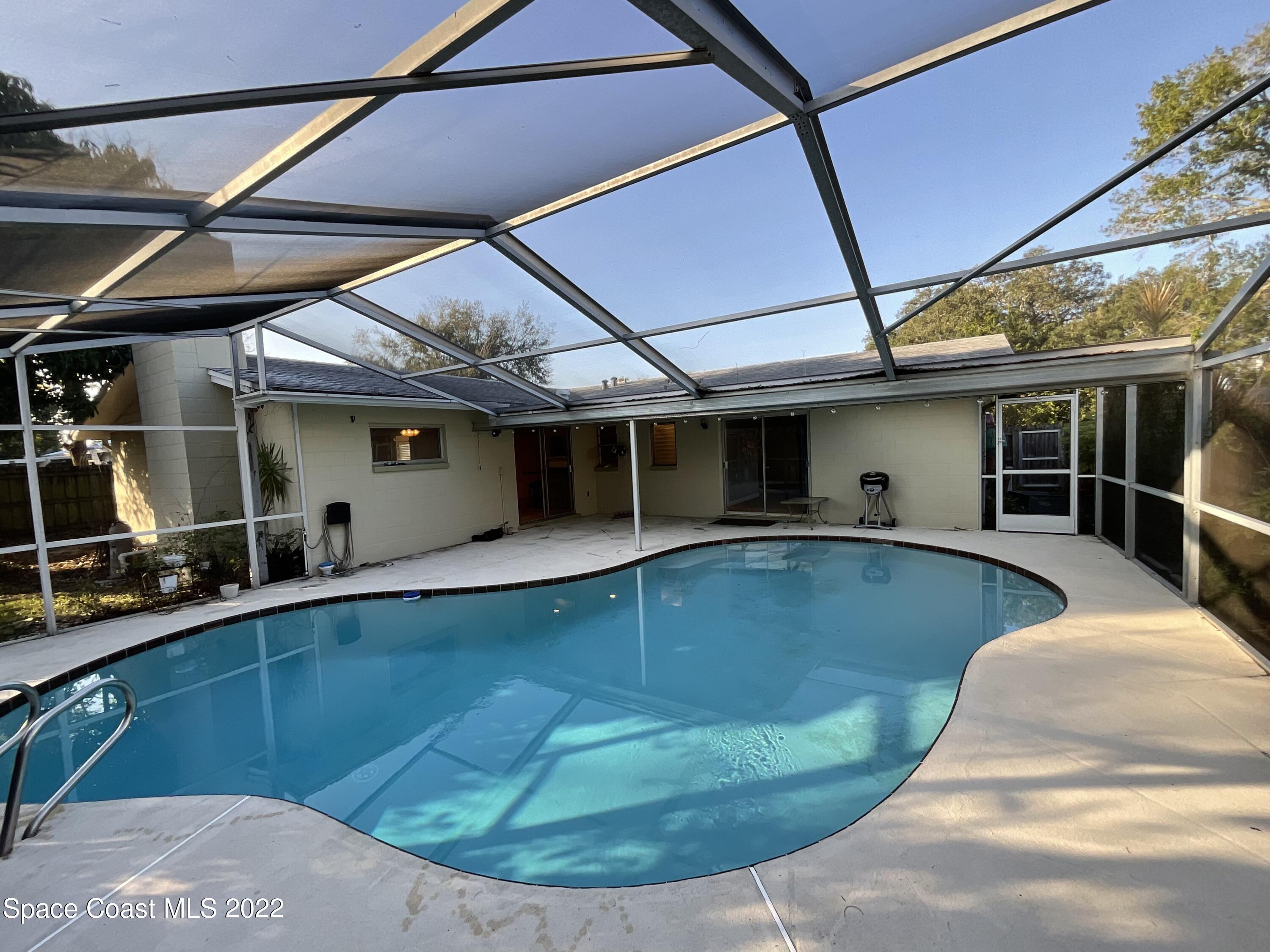 941 Kings Post Road Rockledge, FL 32955 - Photo 2 of 13 9A94F343-8618-456E-A683-C1C8CDA9145E