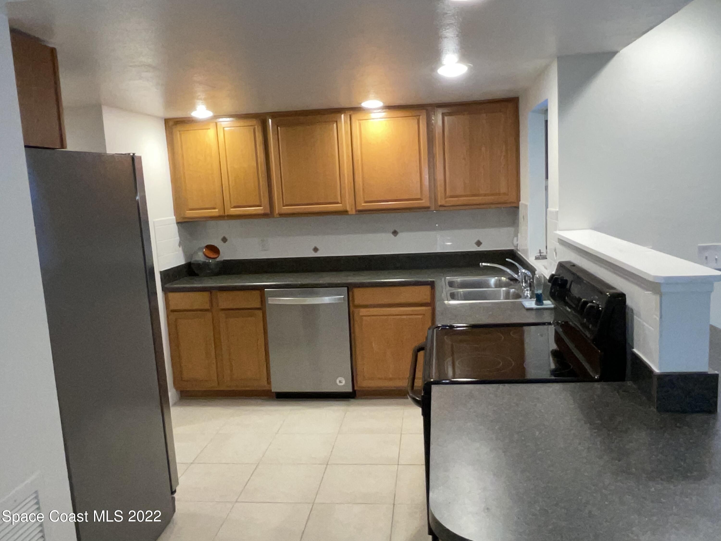 941 Kings Post Road Rockledge, FL 32955 - Photo 3 of 13 2726265F-BF63-4D74-B54A-BDFF0ECBCE86