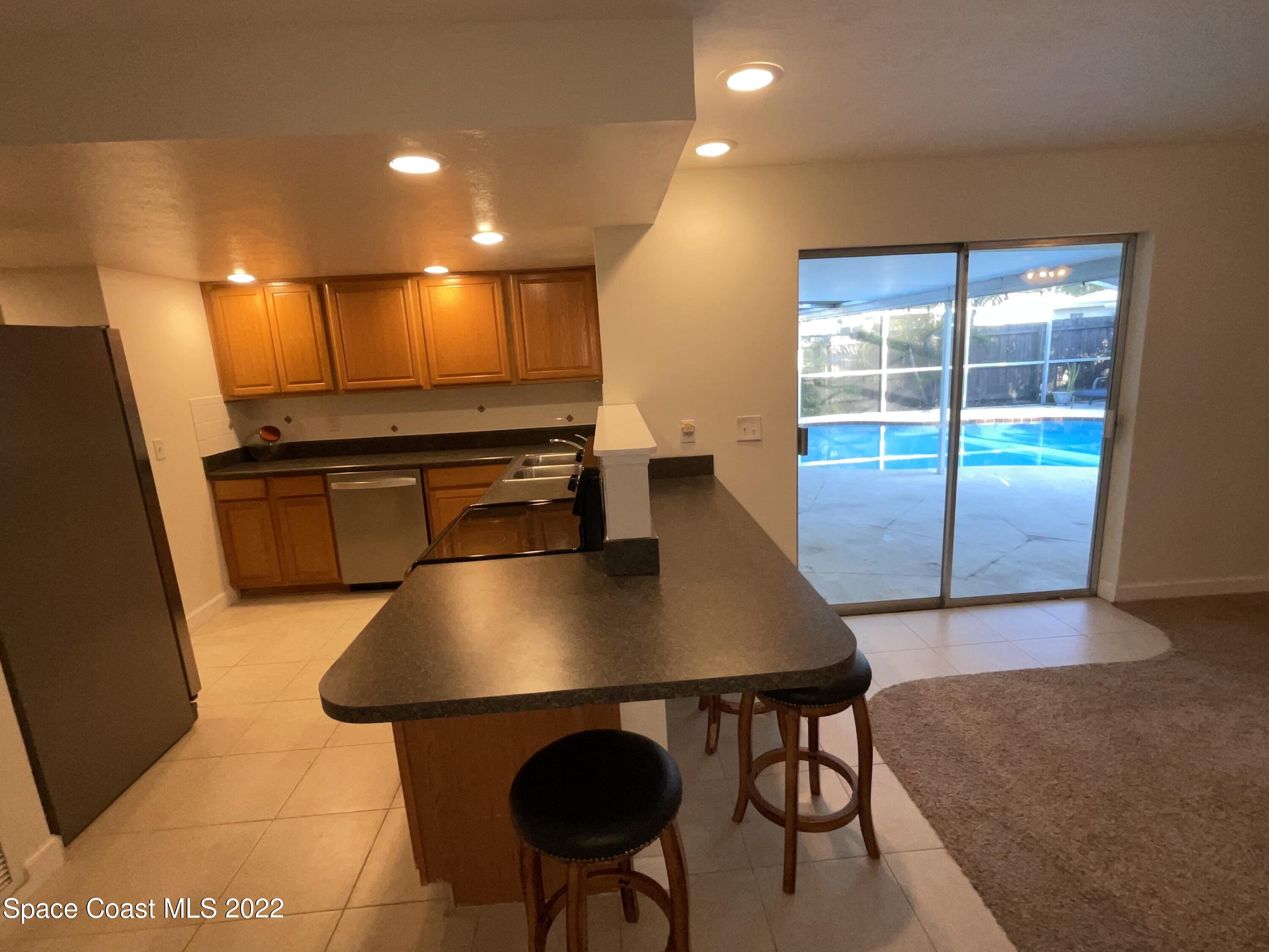 941 Kings Post Road Rockledge, FL 32955 - Photo 4 of 13 D95A13D4-CF9F-4336-9B66-5F1592A72223
