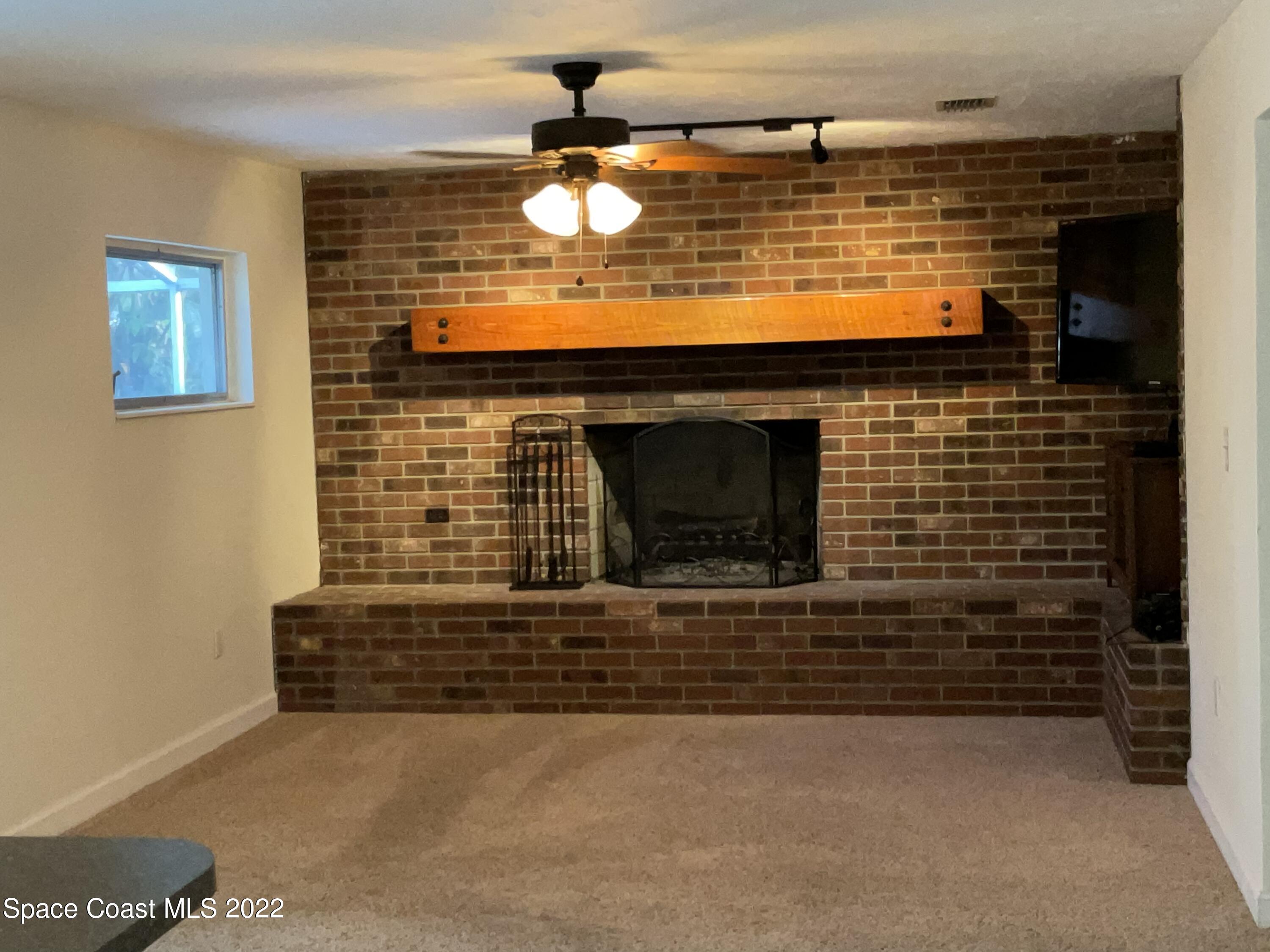 941 Kings Post Road Rockledge, FL 32955 - Photo 7 of 13 5DE8CEE5-8ACE-4C8C-883A-131186E4AFA2