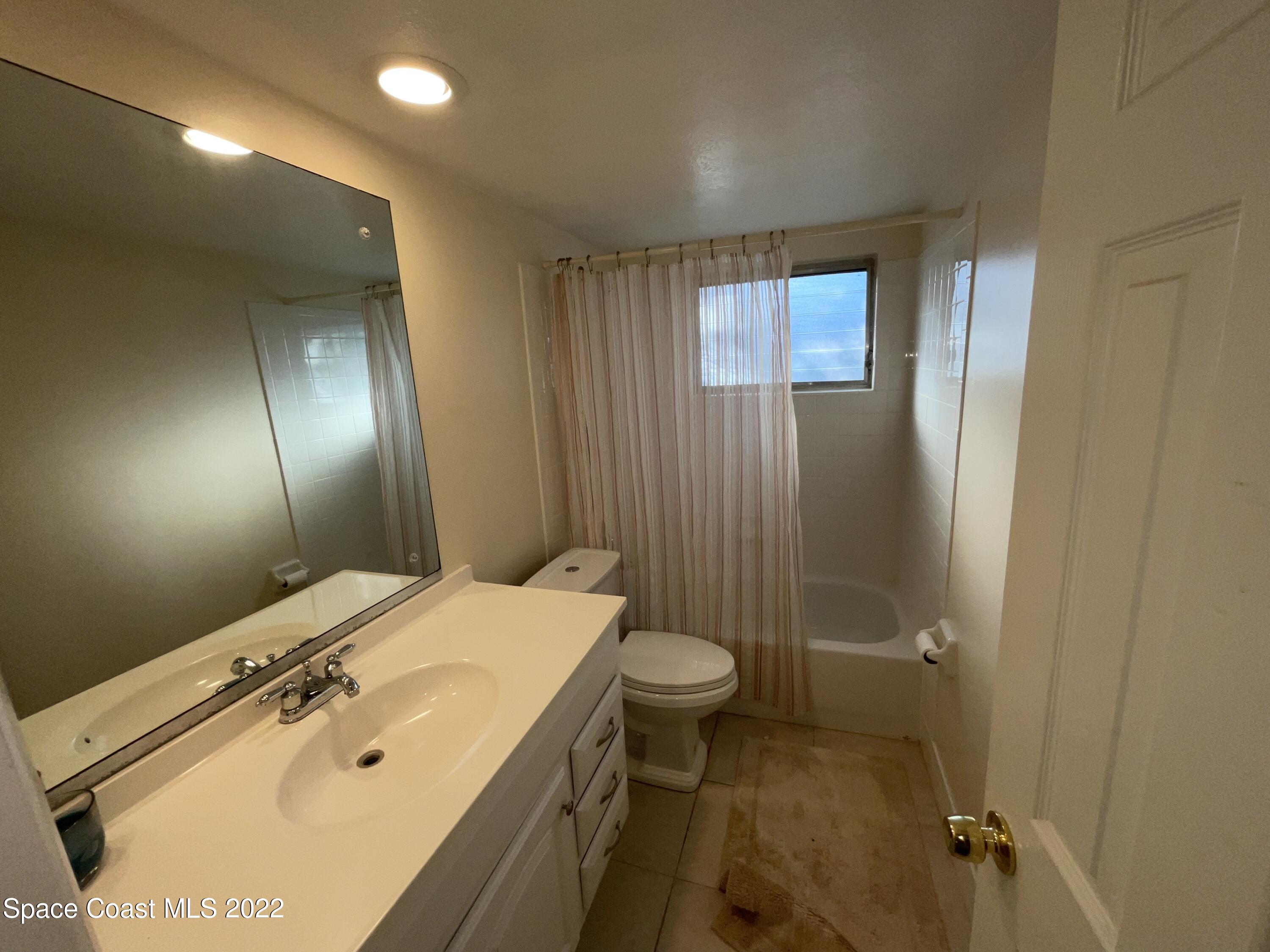 941 Kings Post Road Rockledge, FL 32955 - Photo 8 of 13 AED6ADFA-225B-4502-BD57-02658AF82257