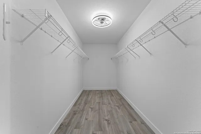 a view of a room with racks on the wall