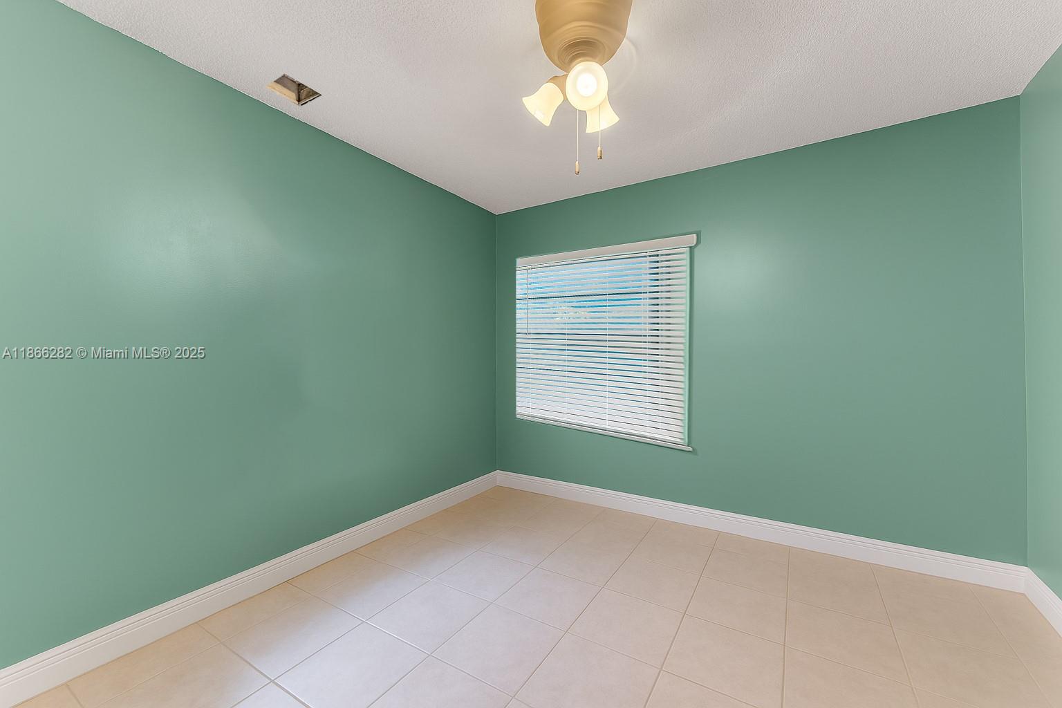 13231 Southwest 86th Street Miami, FL 33183 - Photo 17 of 31 a view of a big room with windows