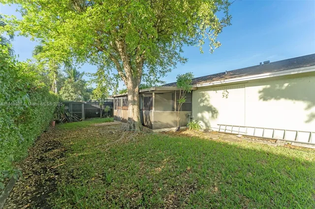 a view of a backyard with a garden