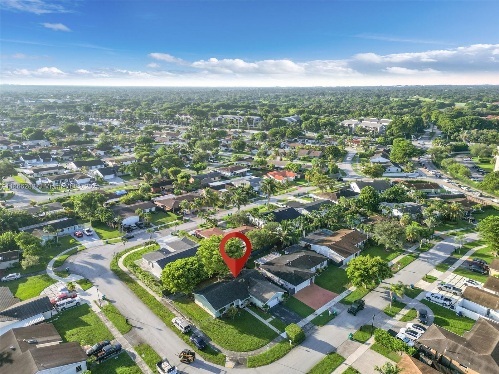 13231 Southwest 86th Street Miami, FL 33183 - Photo 26 of 31 an aerial view of residential houses with outdoor space and street view