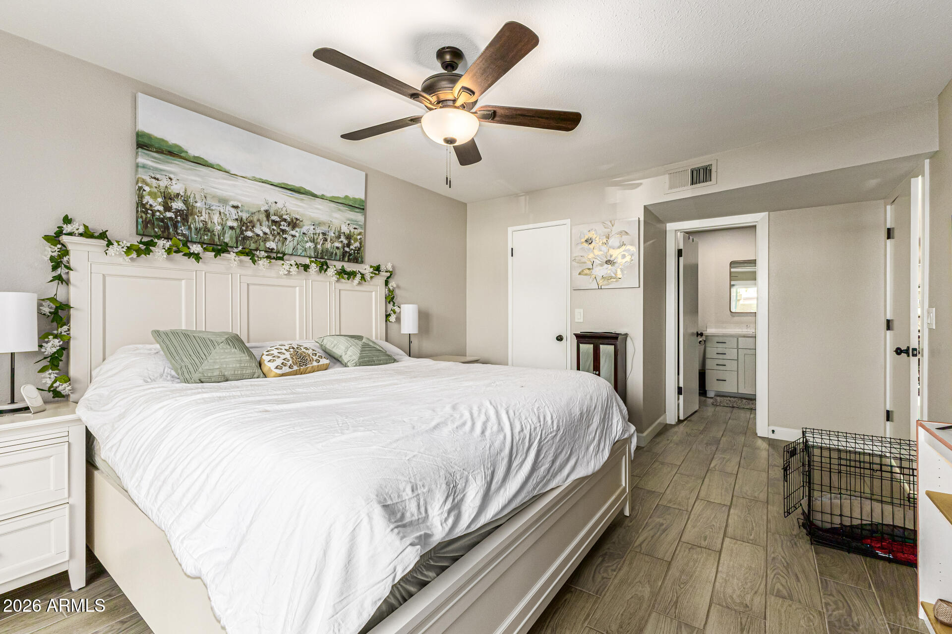 847 West Rice Drive Tempe, AZ 85283 - Photo 16 of 40 a bedroom with bed and wooden floor