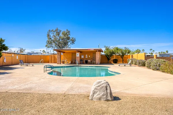 a view of a large building with a big yard