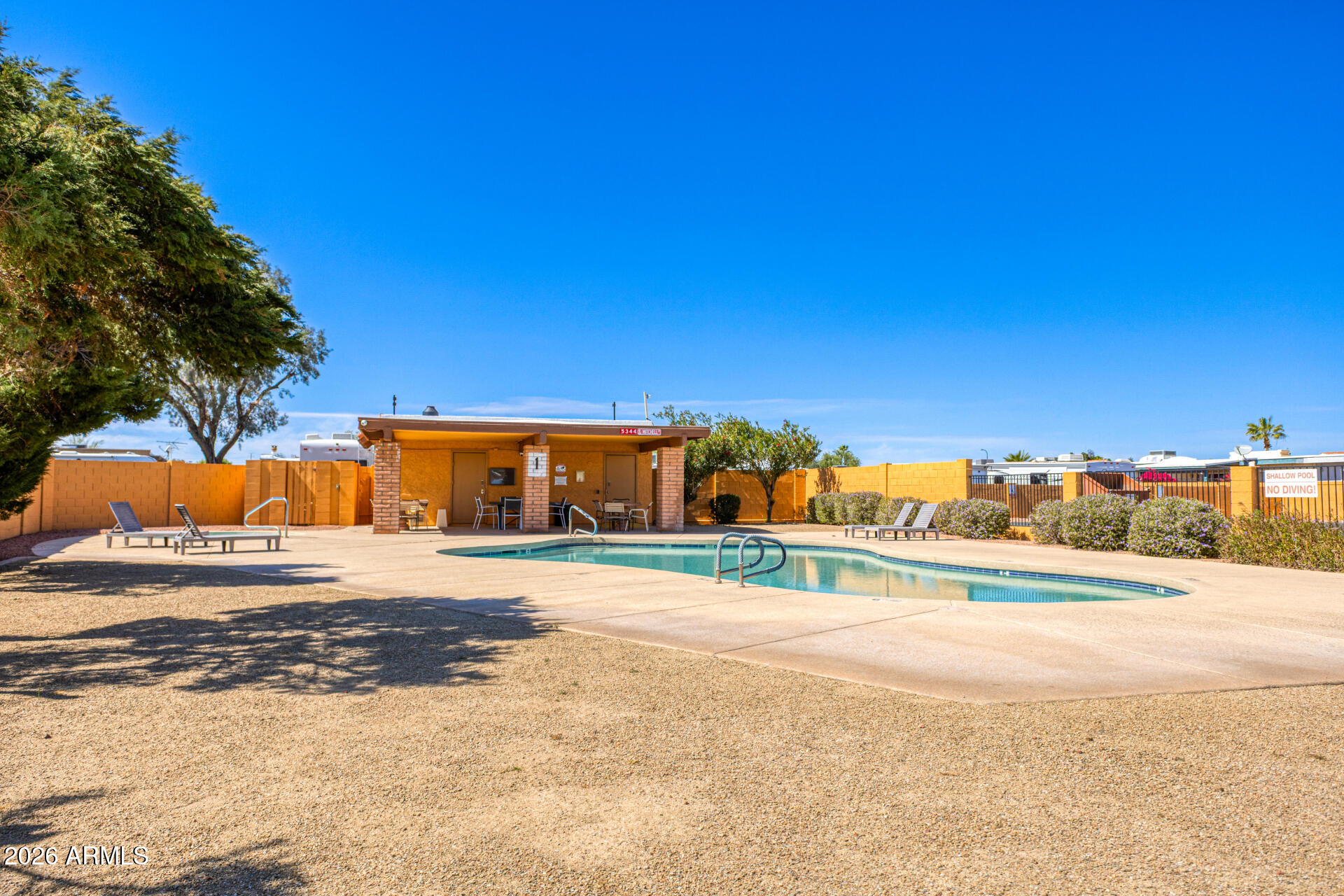 847 West Rice Drive Tempe, AZ 85283 - Photo 34 of 40 a view of a large building with a big yard