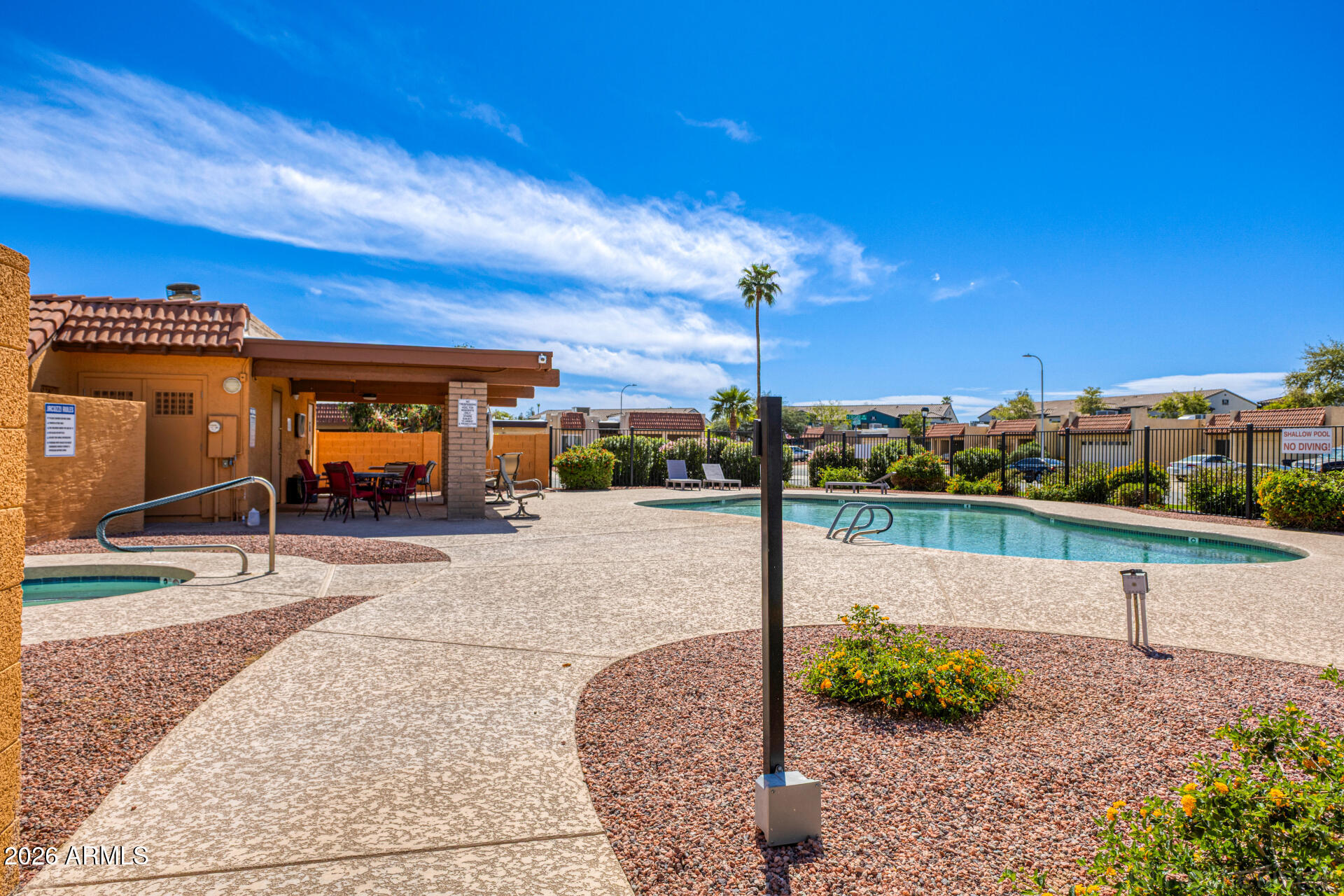 847 West Rice Drive Tempe, AZ 85283 - Photo 35 of 40 a view of a patio with a table and chairs