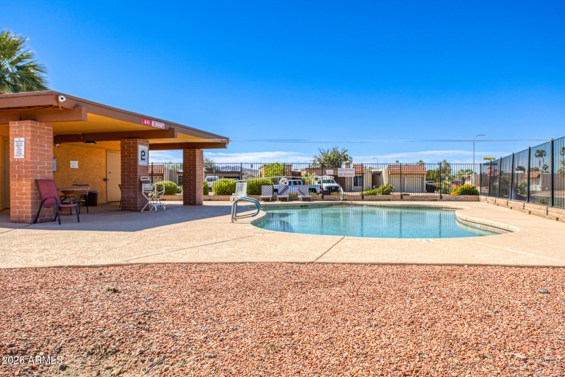 847 West Rice Drive Tempe, AZ 85283 - Photo 40 of 40 a view of a swimming pool and a chairs
