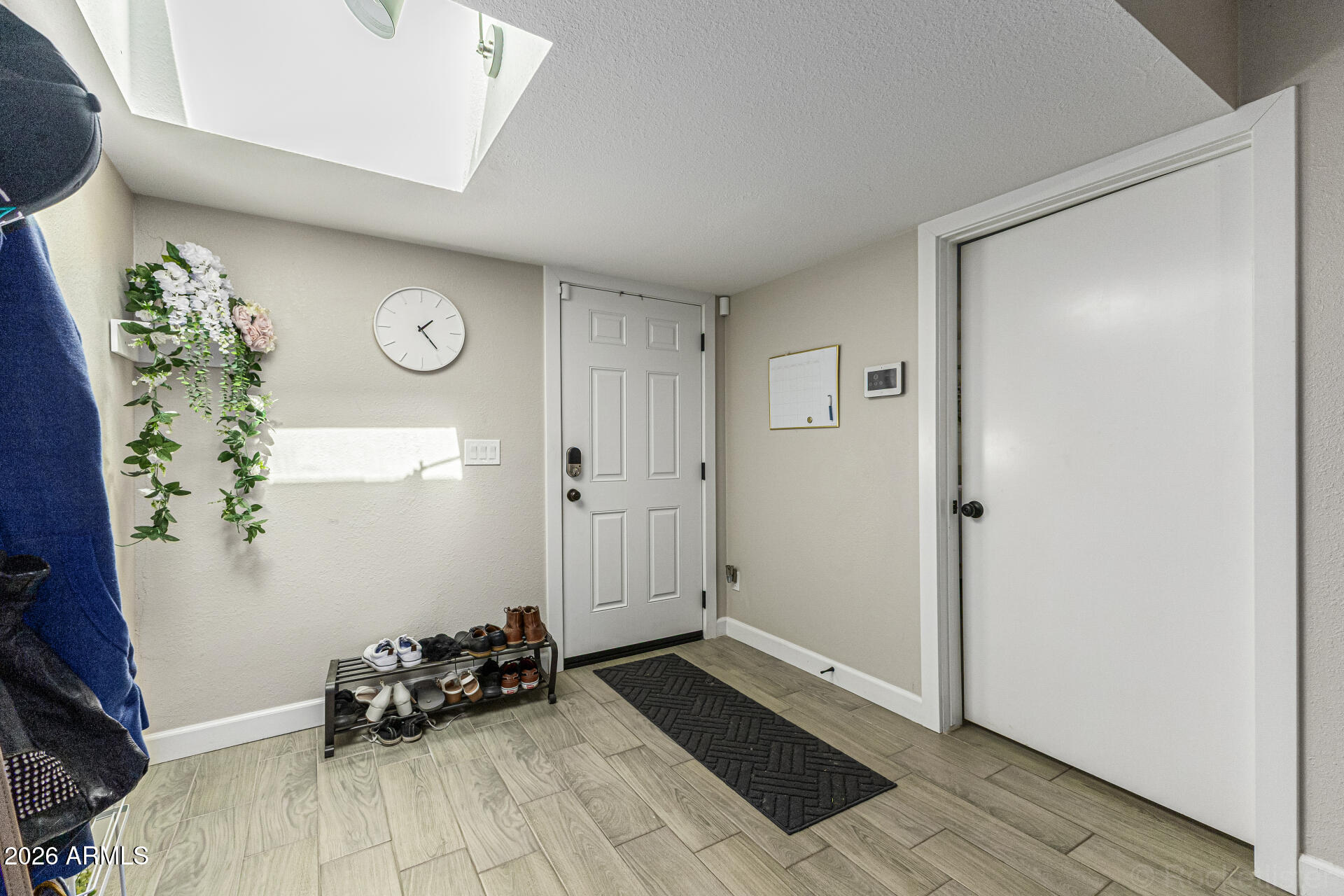 847 West Rice Drive Tempe, AZ 85283 - Photo 5 of 40 a view of a room with wooden floor and windows