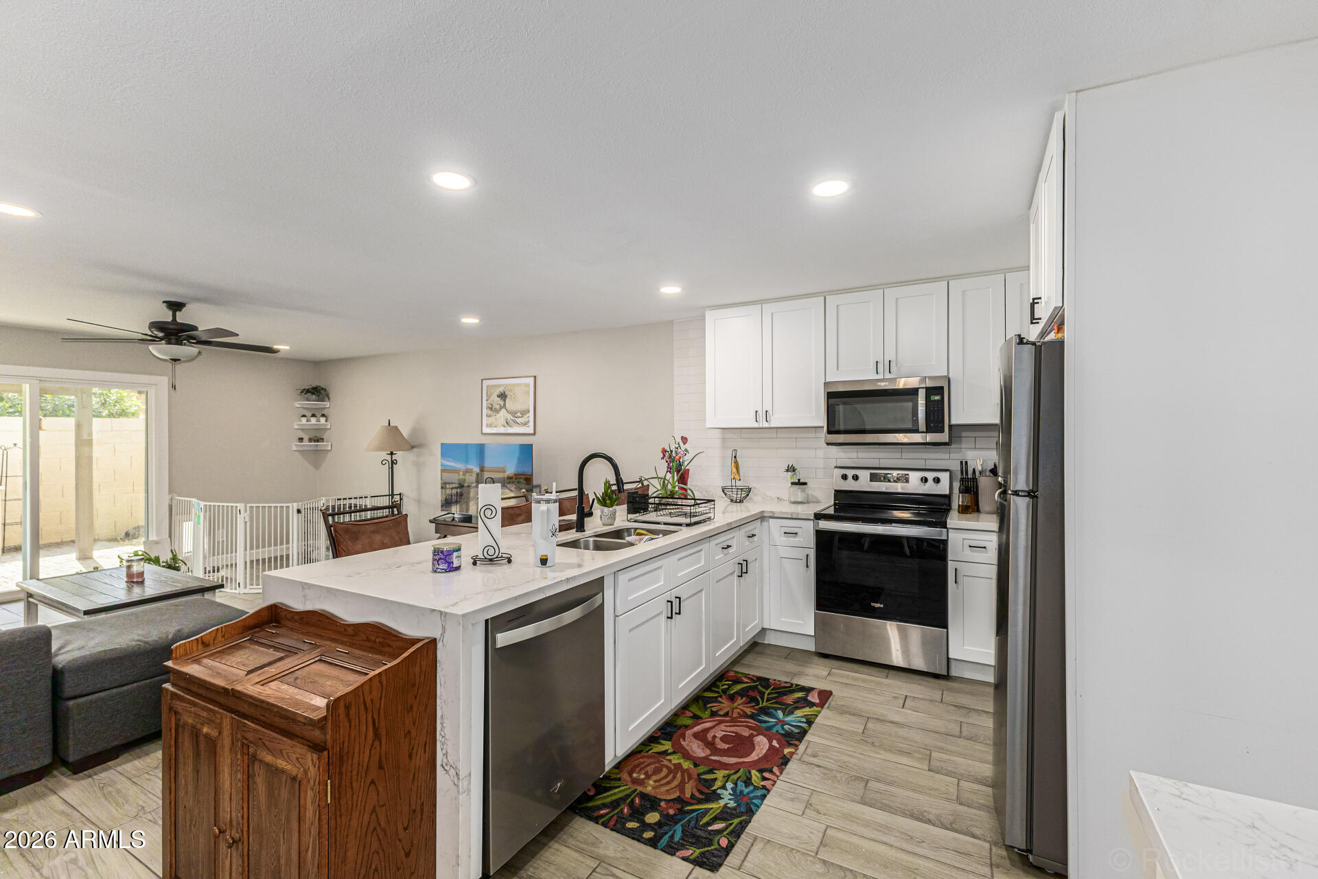 847 West Rice Drive Tempe, AZ 85283 - Photo 9 of 40 a kitchen with a sink stove and refrigerator