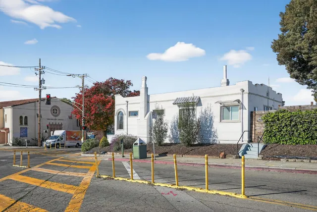 a view of a building with a street