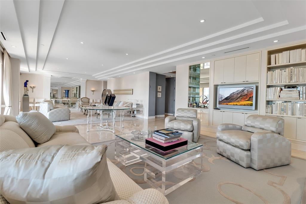 1111 Ritz Carlton Drive, Unit 1202 Sarasota, FL 34236 - Photo 12 of 49 a living room with furniture and a couch