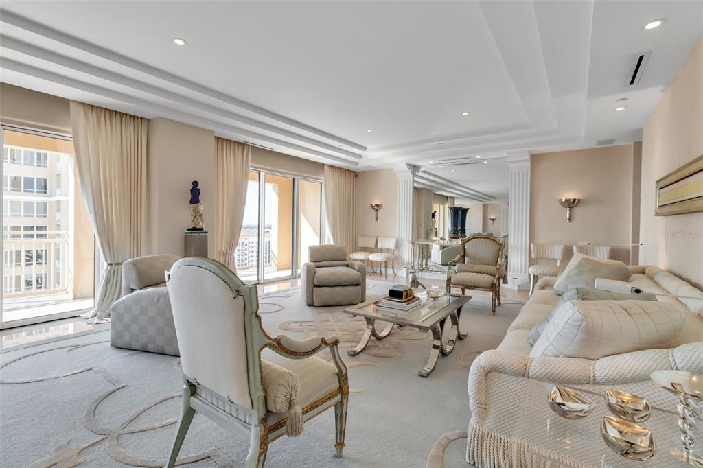 1111 Ritz Carlton Drive, Unit 1202 Sarasota, FL 34236 - Photo 15 of 49 a living room with furniture and a large window