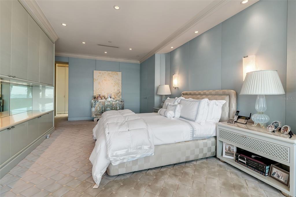 1111 Ritz Carlton Drive, Unit 1202 Sarasota, FL 34236 - Photo 28 of 49 a bed room with a bed and a window