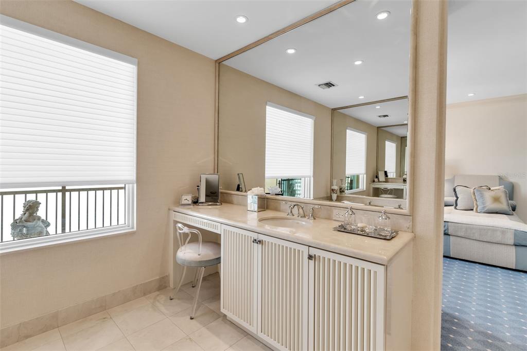 1111 Ritz Carlton Drive, Unit 1202 Sarasota, FL 34236 - Photo 36 of 49 a large white kitchen with a large window