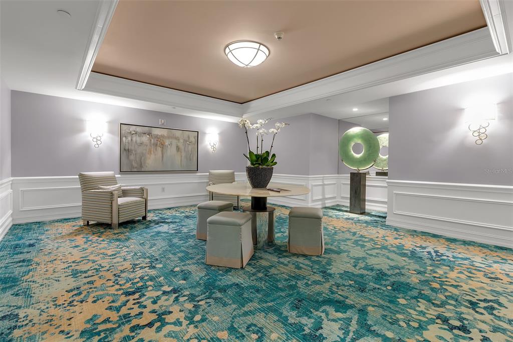 1111 Ritz Carlton Drive, Unit 1202 Sarasota, FL 34236 - Photo 40 of 49 a kitchen with a sink and a stove top oven