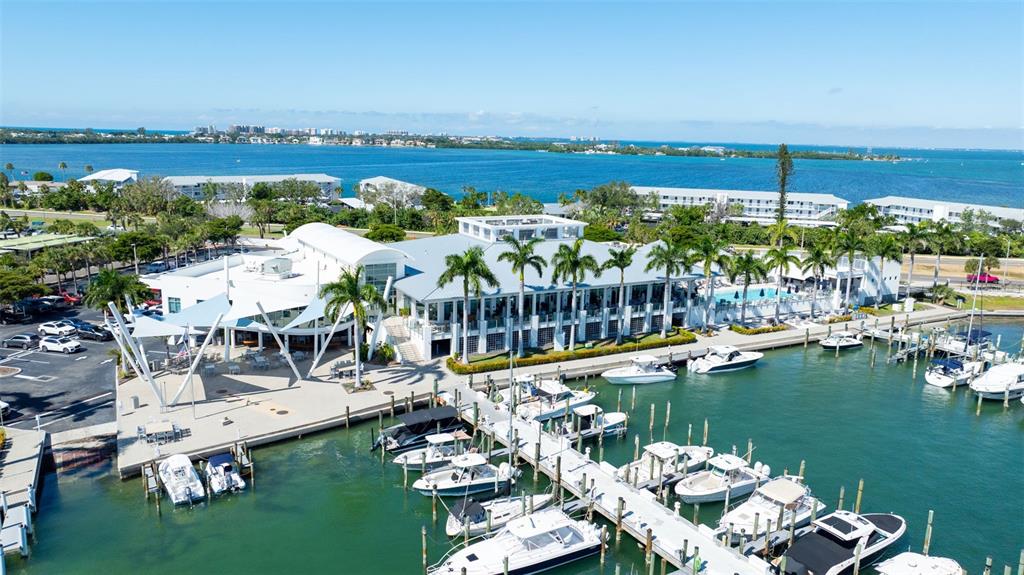 1111 Ritz Carlton Drive, Unit 1202 Sarasota, FL 34236 - Photo 43 of 49 a view of a lake with a city