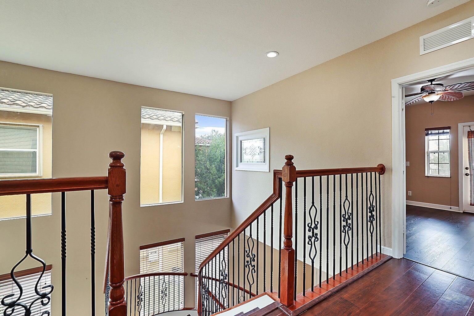 748 Cresta Circle West Palm Beach, FL 33413 - Photo 28 of 62 a view of staircase with rug floor