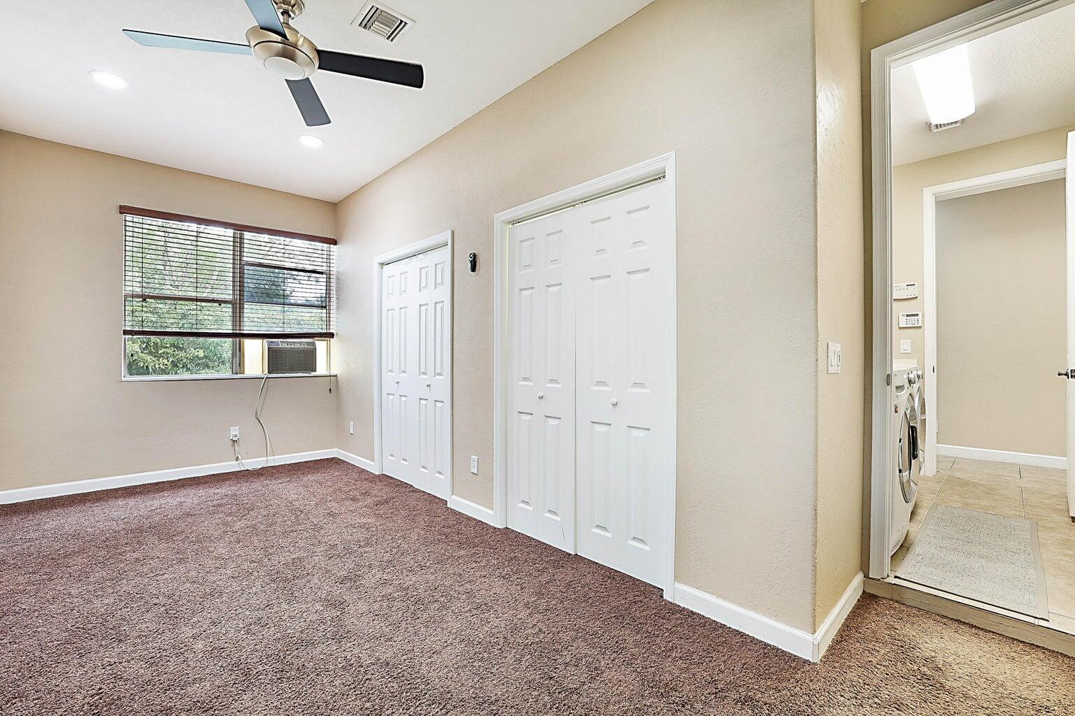 748 Cresta Circle West Palm Beach, FL 33413 - Photo 43 of 62 a view of an empty room with a window
