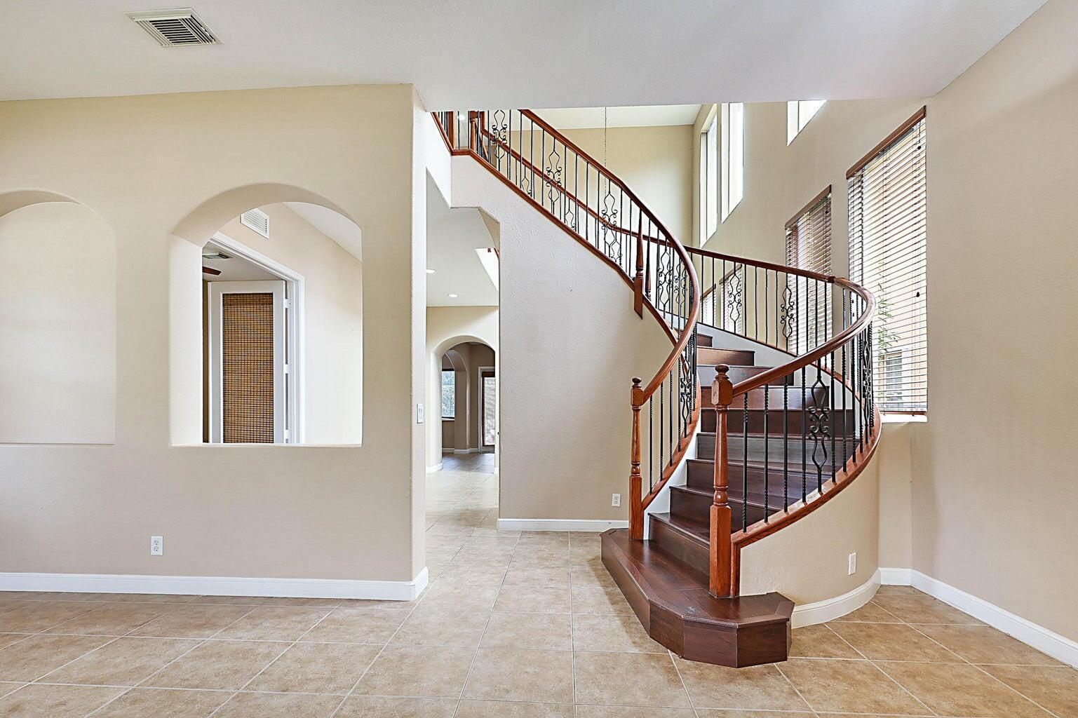 748 Cresta Circle West Palm Beach, FL 33413 - Photo 5 of 62 a view of entryway and hall with wooden floor