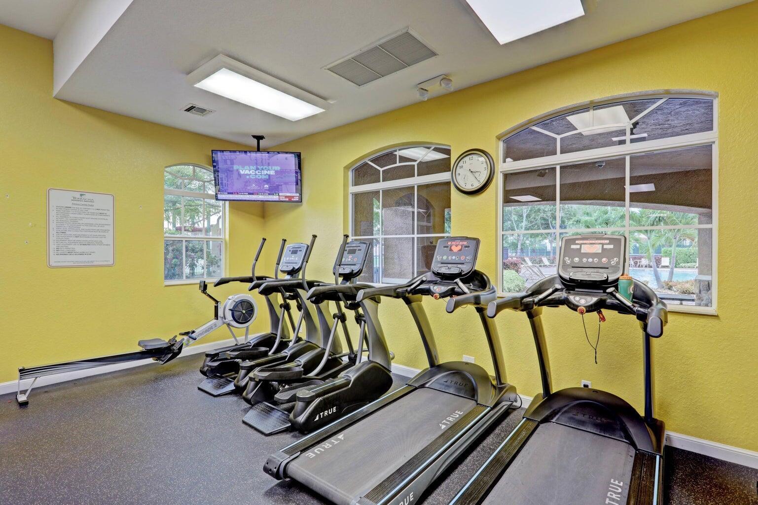 748 Cresta Circle West Palm Beach, FL 33413 - Photo 55 of 62 a view of a room with gym equipment