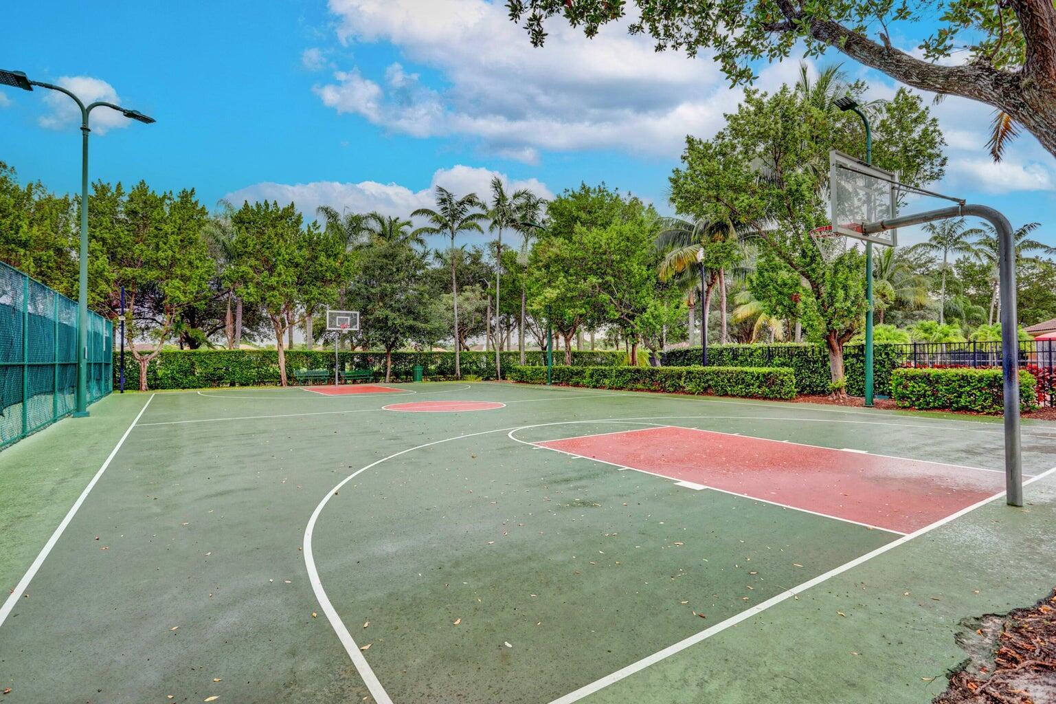 748 Cresta Circle West Palm Beach, FL 33413 - Photo 58 of 62 a view of a tennis court