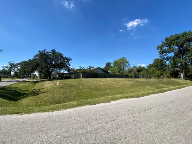 a view of a garden and basketball court