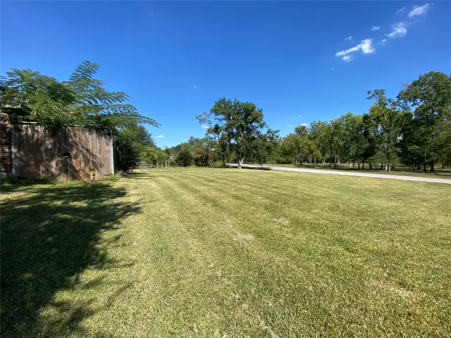 a view of a field with an outdoor space