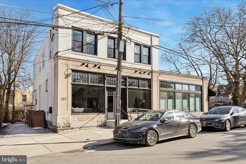 a car parked in front of a building