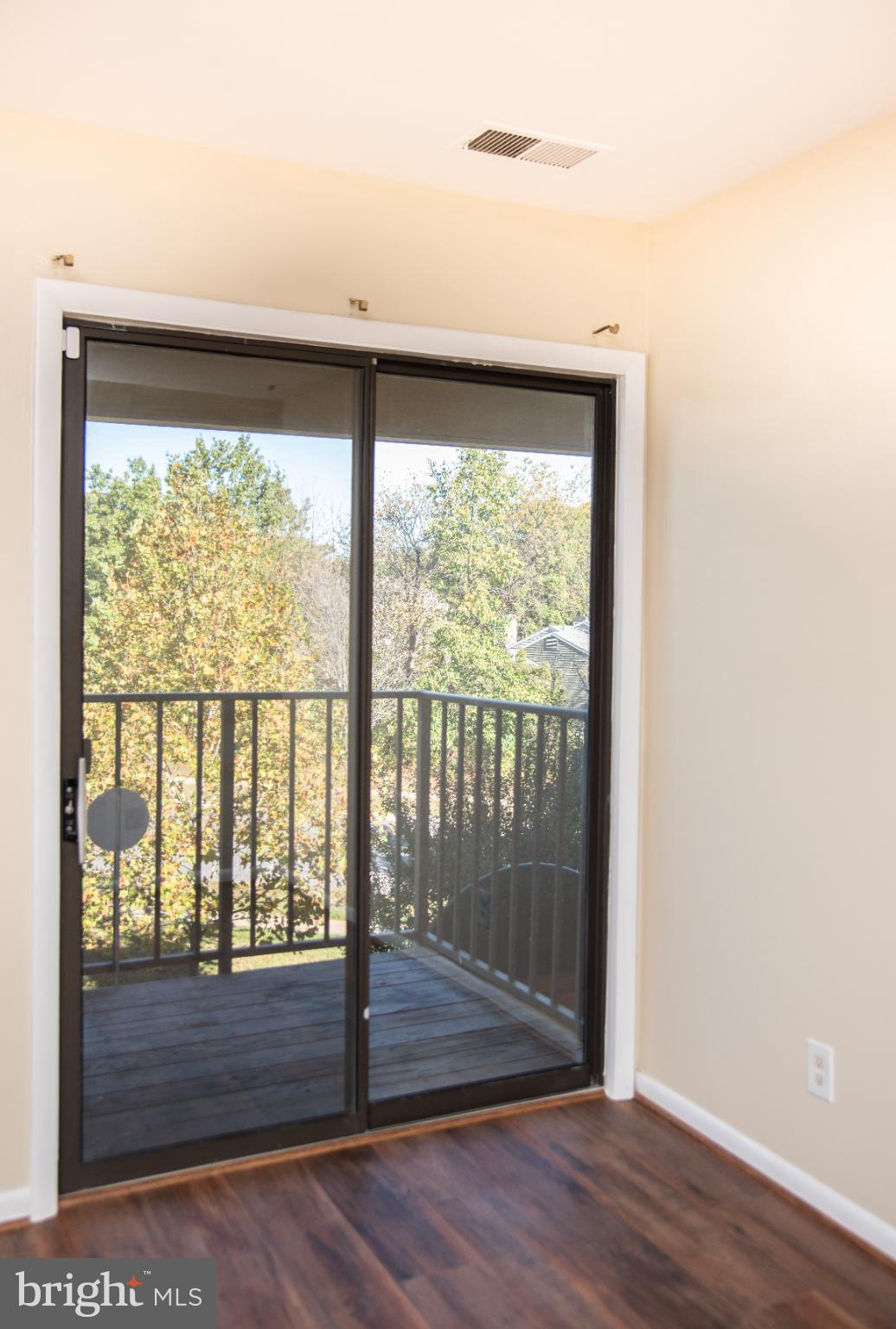 13408 Shady Knoll Drive, Unit 308 Silver Spring, MD 20904 - Photo 14 of 21 Bright balcony access with serene views.