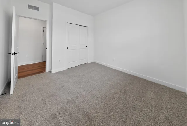 an empty room with an entryway
