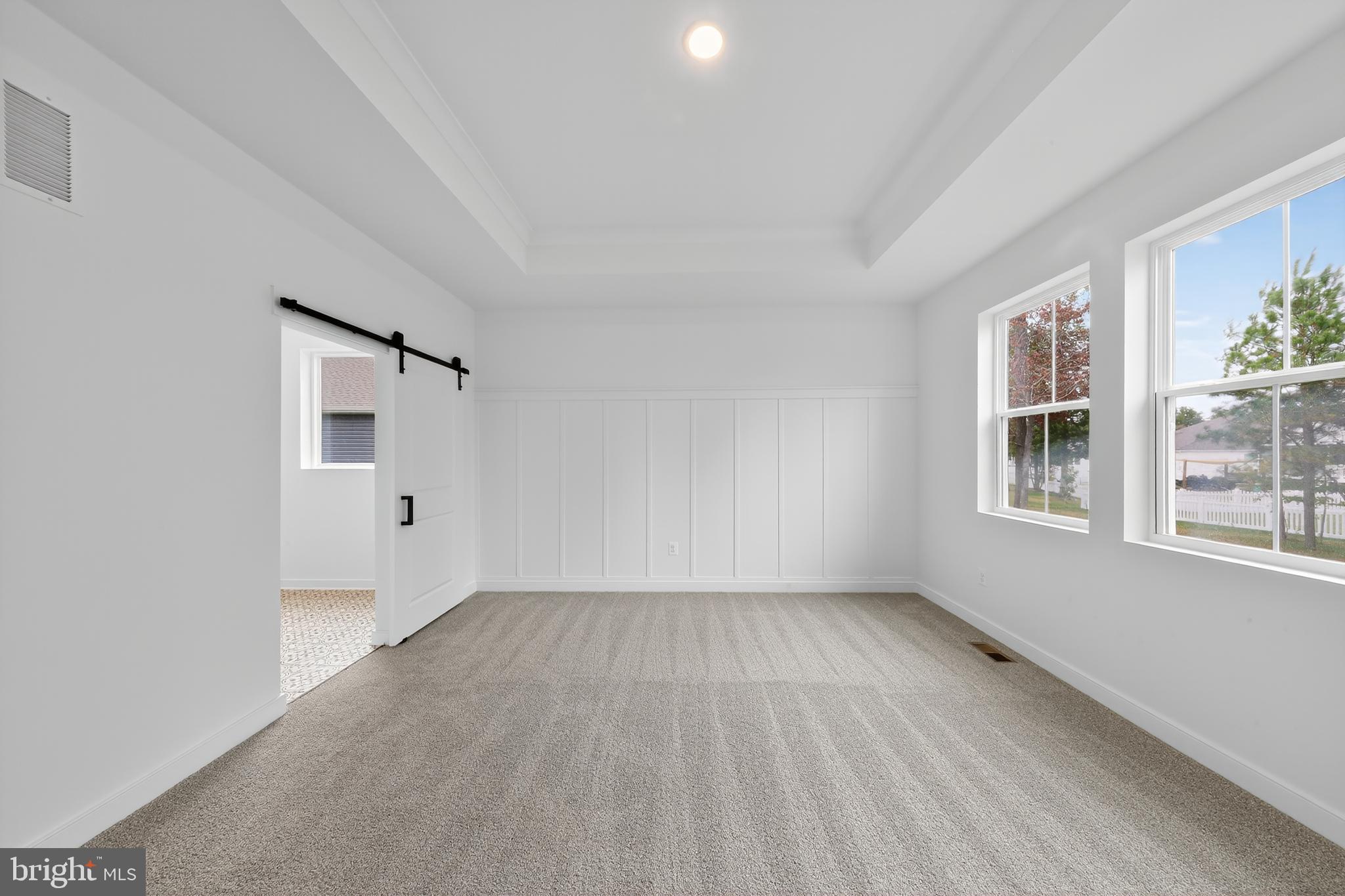 36444 Maple Ridge Lane Georgetown, DE 19947 - Photo 9 of 29 a view of an empty room with a window