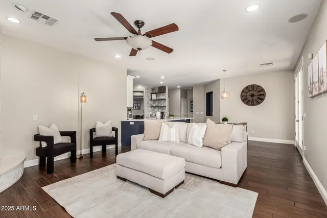 a bedroom with a bed and a mirror