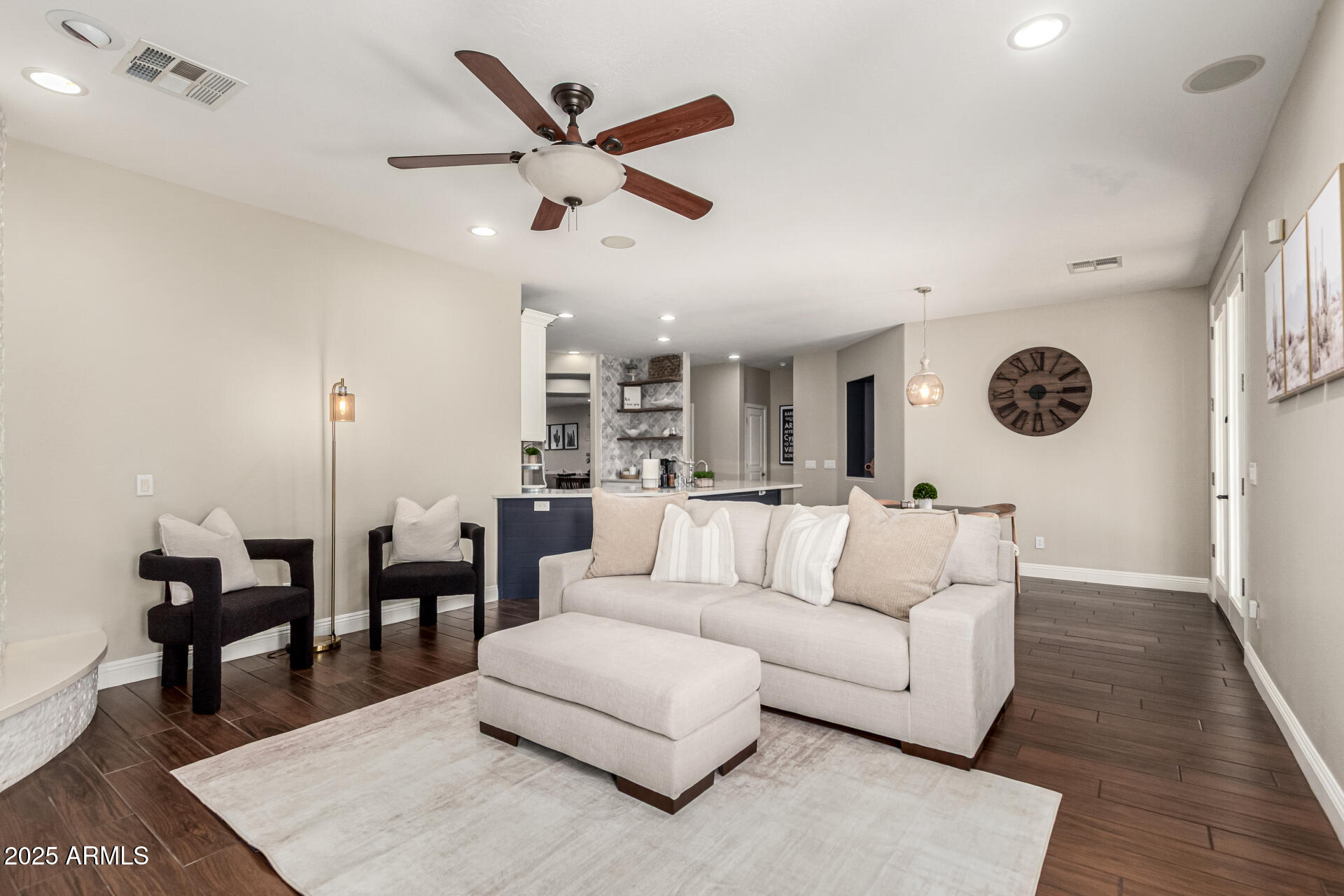 11411 East Sebring Circle Mesa, AZ 85212 - Photo 12 of 87 a living room with furniture and wooden floor