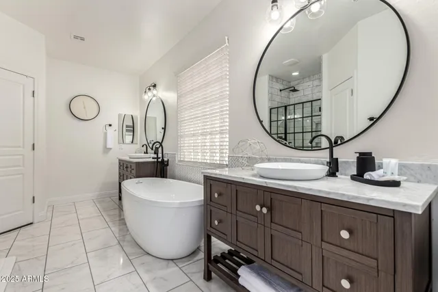 a view of a livingroom with a flat screen tv and furniture