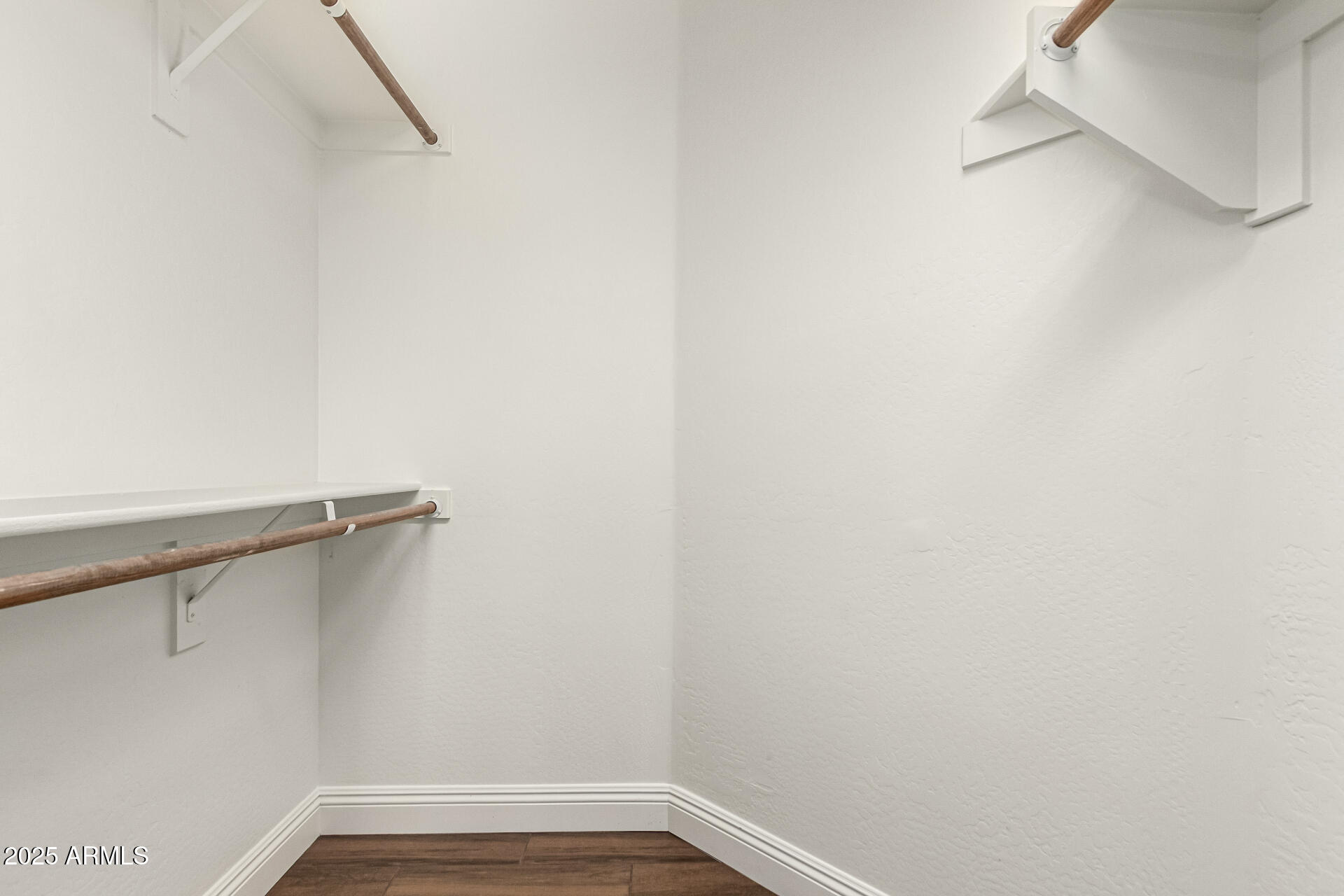 11411 East Sebring Circle Mesa, AZ 85212 - Photo 23 of 87 a view of a room with racks on the wall