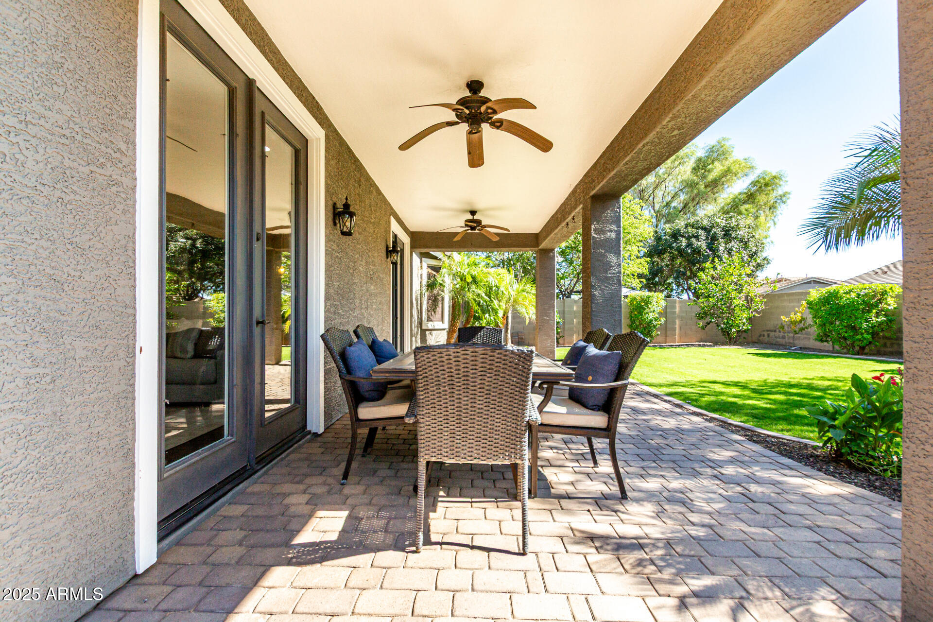 11411 East Sebring Circle Mesa, AZ 85212 - Photo 34 of 87 a view of a patio with a table and chairs